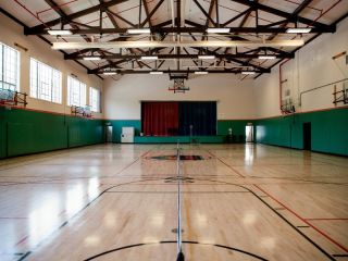 A Basketball Court In A Gym